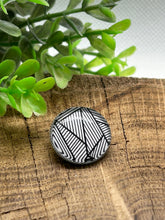 Broche noire